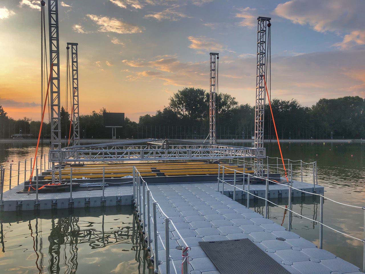 Floating dock with metal frame at sunset
